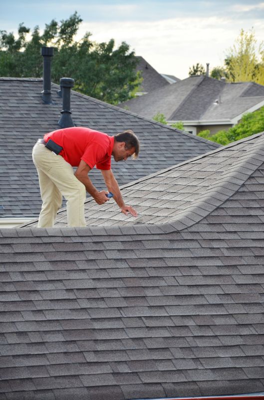 Routine Maintenance on Asphalt Roof